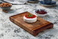 Dessert made from camembert cheese and strawberries jam Royalty Free Stock Photo