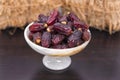 Dessert Mebrum dates Hurma stuffed in a marble bowl. Royalty Free Stock Photo