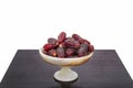 Dessert Mebrum dates Hurma stuffed in a marble bowl. Royalty Free Stock Photo