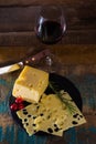 Dessert with medium-hard mild Swiss cheese Emmental and glass re Royalty Free Stock Photo