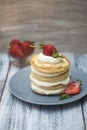 Dessert Pancakes with Cream and Strawbery. Health Breakfast Fruit Berry Vitamine Gray Rustic Wooden Background Royalty Free Stock Photo