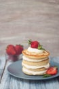 Dessert Pancakes with Cream and Strawbery. Health Breakfast Fruit Berry Vitamine Gray Rustic Wooden Background Royalty Free Stock Photo