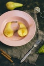 Dessert with pears. Pear in syrup poached. View from above. Royalty Free Stock Photo