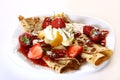 Dessert plate witn pancakes and strawberry