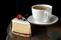 Dessert. A slice of cherry cake and a cup of coffee Royalty Free Stock Photo