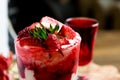 Dessert of soy yogurt and oatmeal, strawberry juice and fresh strawberries on a wooden tray, Royalty Free Stock Photo