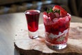 Dessert of soy yogurt and oatmeal, strawberry juice and fresh strawberries on a wooden tray, Royalty Free Stock Photo