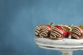 Dessert stand with chocolate covered strawberries