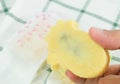 Hand Holding Taiwanese Pineapple Pie with Paper Packaging