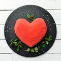 Dessert. Sweet red cream cake in the form of heart. Sweets. Royalty Free Stock Photo