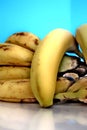 Dessert sweet yellow bananas front a blue background