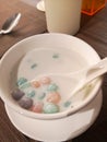 Dessert sweetmeat Rice balls in sweet coconut milk dessertspoon in a bowl Thai food