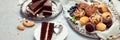 Dessert table with all kinds snacks on light background