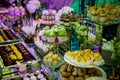 Dessert table for a party. Candy bar. Rich thematic wedding candy bar high variety of sweets Royalty Free Stock Photo