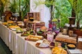 Dessert table of delicious snacks on wedding reception Royalty Free Stock Photo
