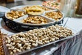 Dessert table of delicious snacks on wedding reception Royalty Free Stock Photo