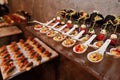 Dessert table of delicious snacks on wedding reception Royalty Free Stock Photo