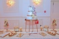 Dessert table for a party,Beautiflu wedding cake at wedding party at night Royalty Free Stock Photo
