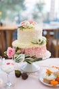 Dessert table for a party. Cake, cupcakes, sweetness and flowers Royalty Free Stock Photo