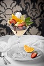 Dessert withl tropical fruits on a retro background on a retro background Royalty Free Stock Photo