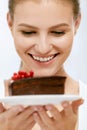 Dessert. Woman Eating Chocolate Cake Royalty Free Stock Photo