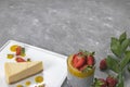 Desserts on a gray concrete background Royalty Free Stock Photo