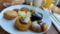 Desserts on a white porcelain plate. Oriental cookies.