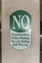 Destin, Florida- Green sign with No skateboarding, rollerblading, bicycle riding, ball playing