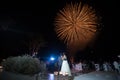 Destination beach wedding fireworks couple looking at