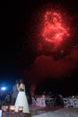 Destination beach wedding fireworks