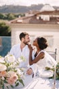 Destination fine-art wedding in Florence, Italy. Multiethnic wedding couple. African-American bride and Caucasian groom