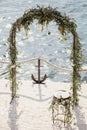 Destination wedding arch with flower decoration Royalty Free Stock Photo