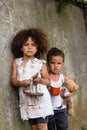 Destitute african american children with plate Royalty Free Stock Photo