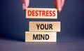 Destress your mind symbol. Concept words Destress your mind on wooden blocks. Doctor hand. Beautiful grey table grey background.