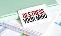 destress your mind words on notepad and charts