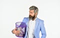 Destroy evidence. Insure important documents. Recover files after deletion. Businessman hold trash can. Man look for Royalty Free Stock Photo