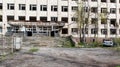 Destroyed administrative building in Ukraine. The damaged facade of the building of the regional state administration Royalty Free Stock Photo