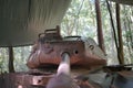 The destroyed American tank in the Cu Chi tunnel in South Vietnam