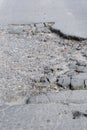 Destroyed asphalt pavement