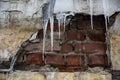 Destroyed brick wall covered with ice Royalty Free Stock Photo