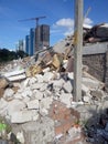 Destroyed building, earthquake, pile of rubble and debris, landfill