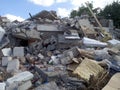 Destroyed building, earthquake, pile of rubble and debris, landfill