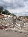 Destroyed building, earthquake, pile of rubble and debris,