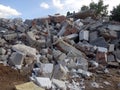 Destroyed building, earthquake, pile of rubble and debris, landfill