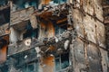 Damage to a residential building as a result of artillery strikes.