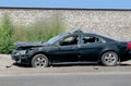 Destroyed car on side of the road Royalty Free Stock Photo