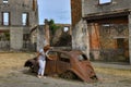 Destroyed cars and buildings during World War 2 in the city Oradour sur Glane France Royalty Free Stock Photo