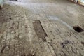 Destroyed concrete flooring with tile surface due to subsidence of the base soil