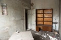 Destroyed desk and book shelf in the principla's office Royalty Free Stock Photo