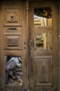 Destroyed door of a house in ruins